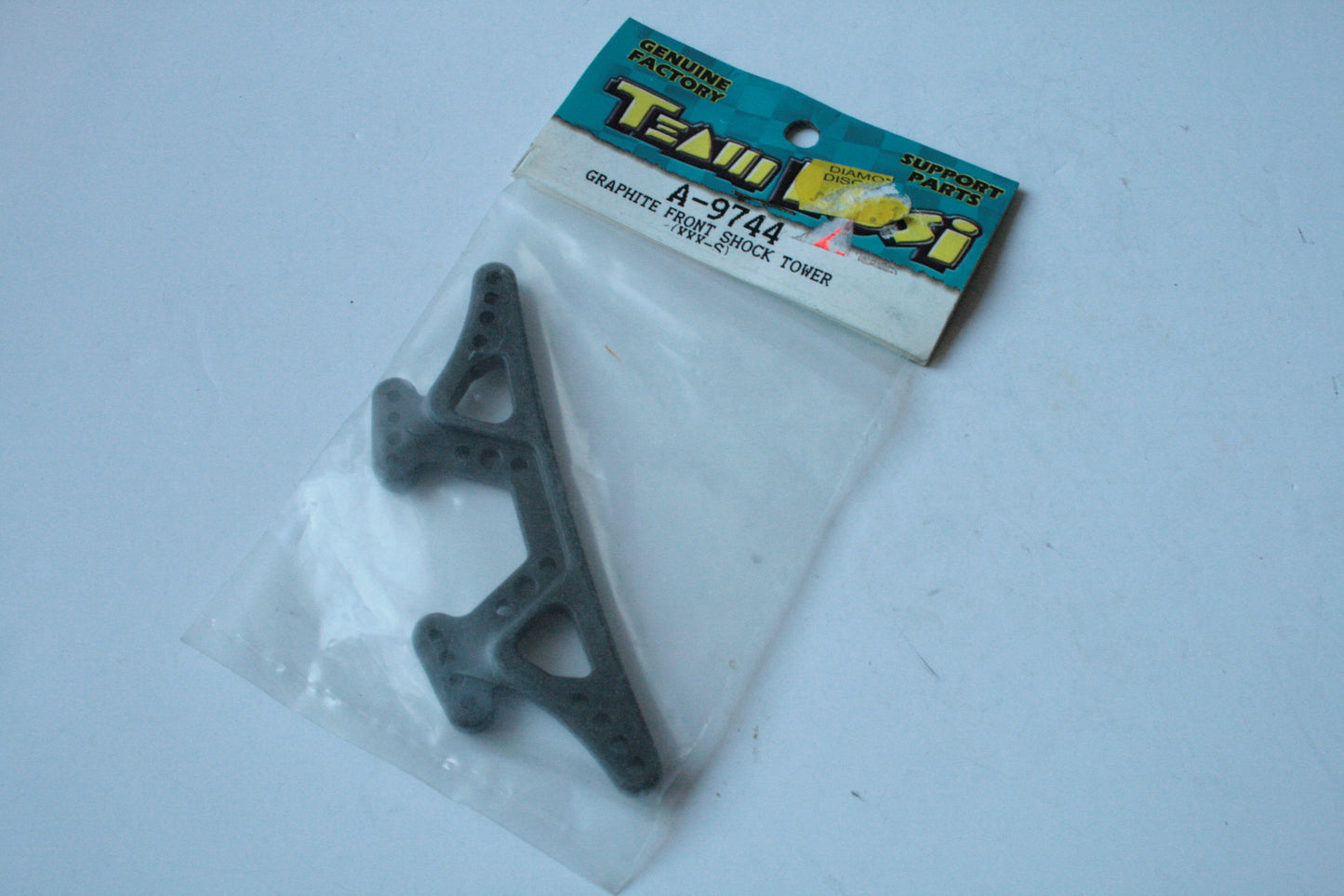 Losi A-9744 Graphite Front Shock Tower For XXX-S - A9744 XXXS