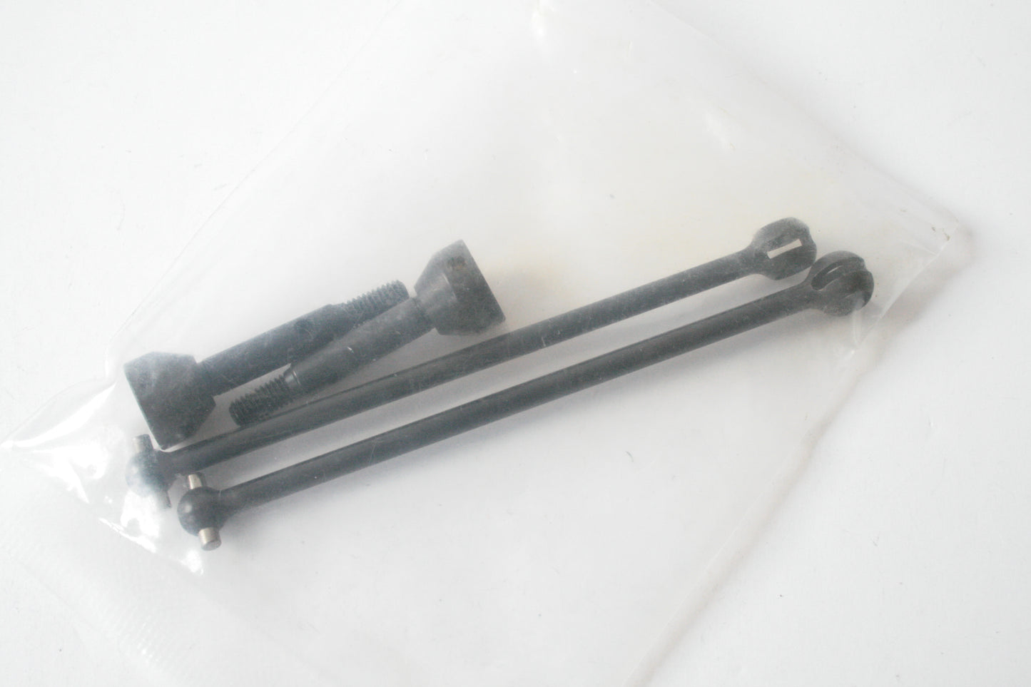 Pair of CVD Driveshafts (Unknown, Maybe Associated)
