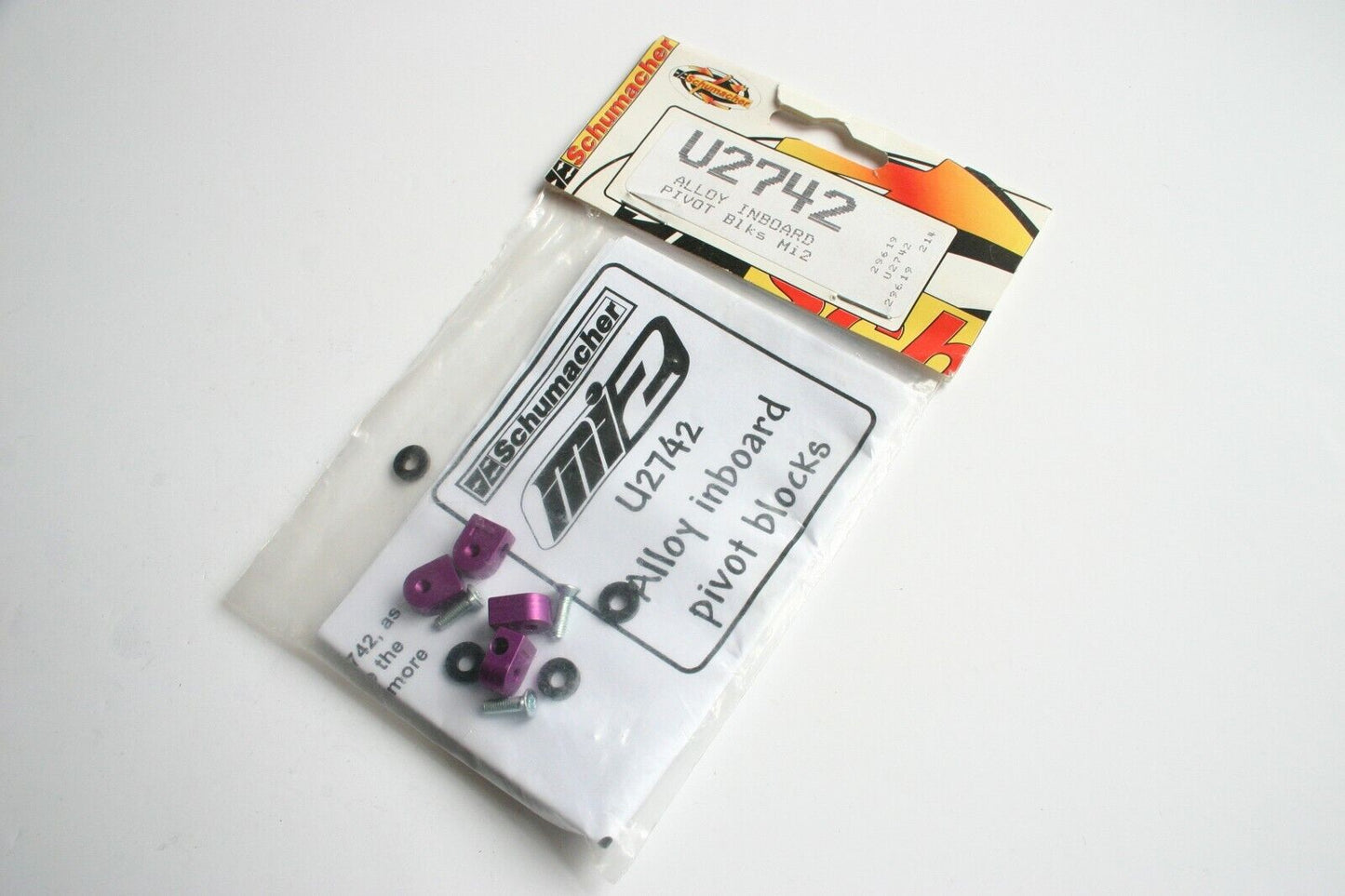 Schumacher Mi2 Purple Alloy Inboard Pivot Blocks - U2742