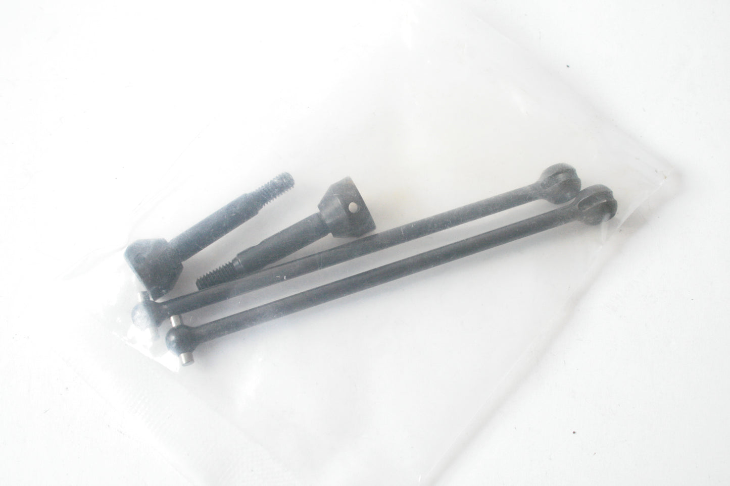 Pair of CVD Driveshafts (Unknown, Maybe Associated)